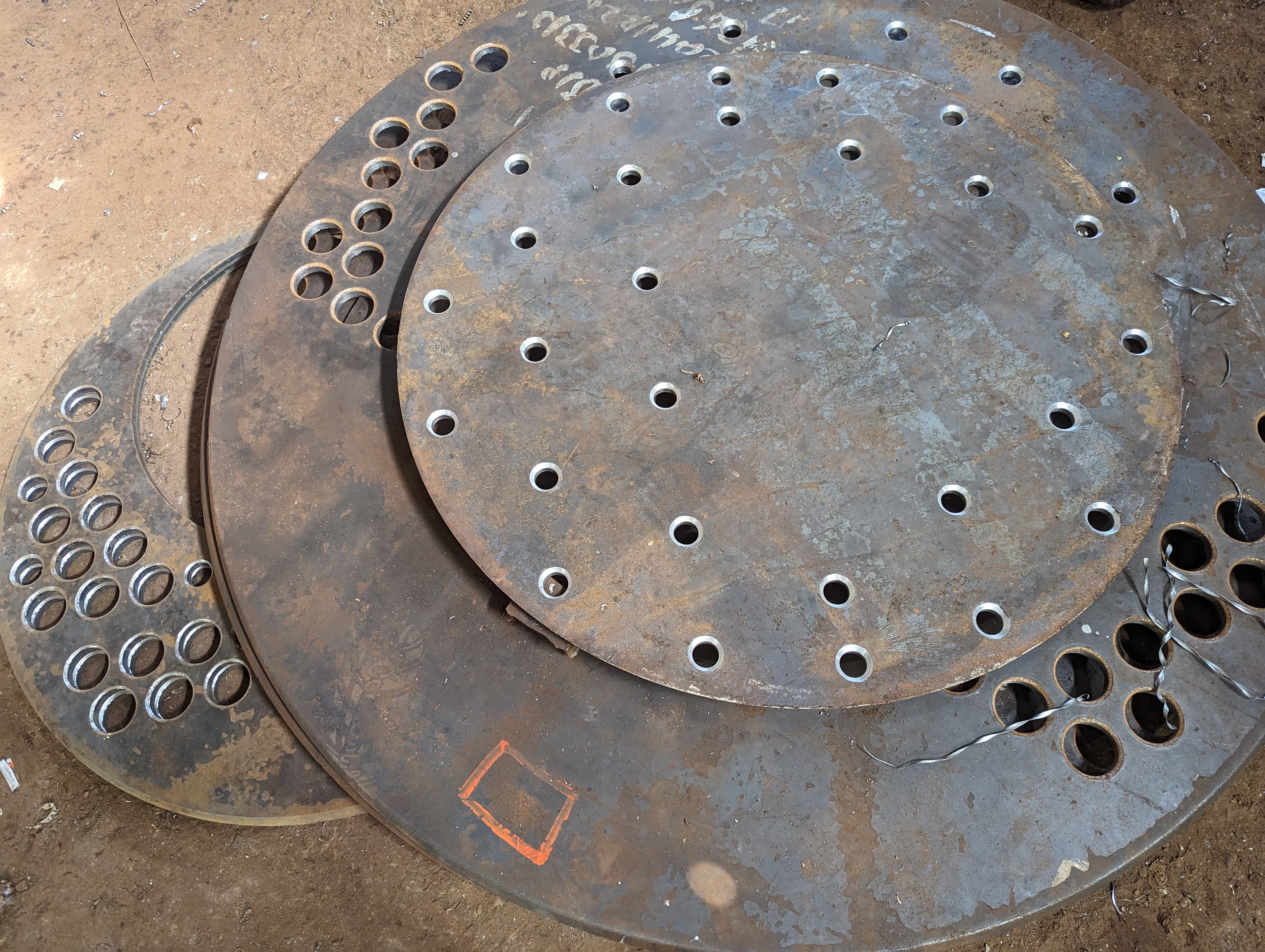 Large heavy-duty drilled tubesheets with multiple hole patterns for industrial boilers