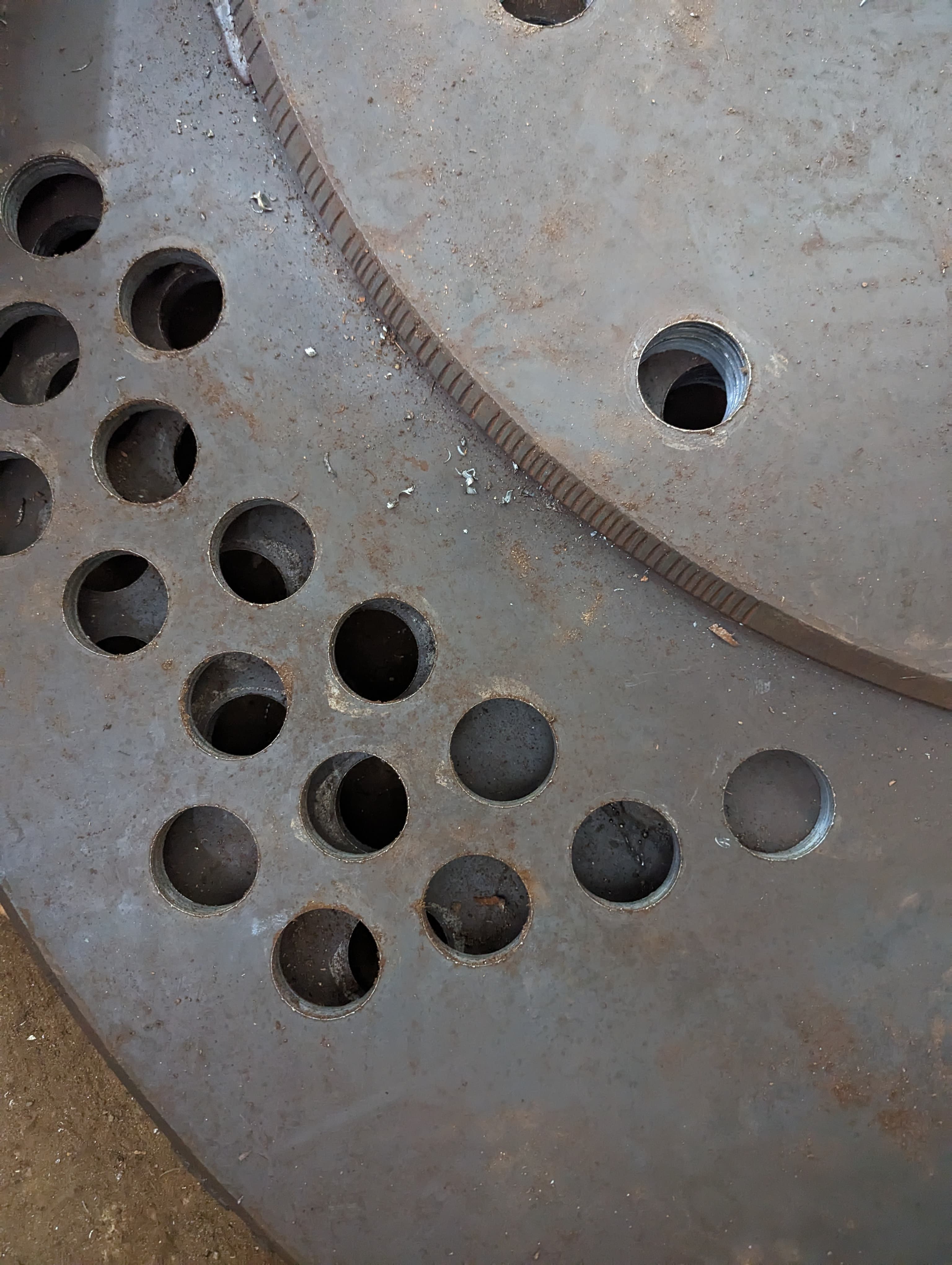Close-up of precision drilled holes on MS tubesheet for boiler application